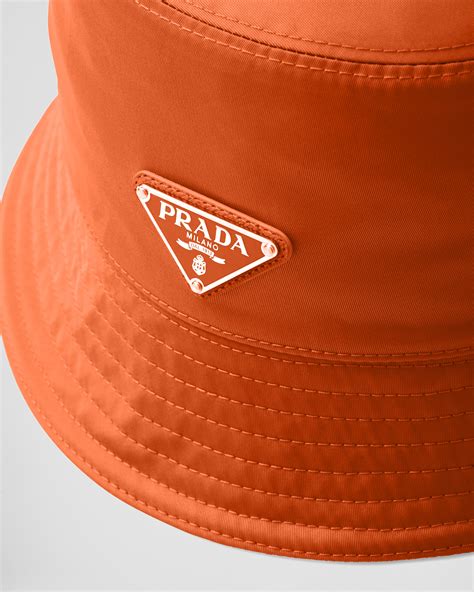 prada nylon bucket hat beige|prada bucket hat sizing.